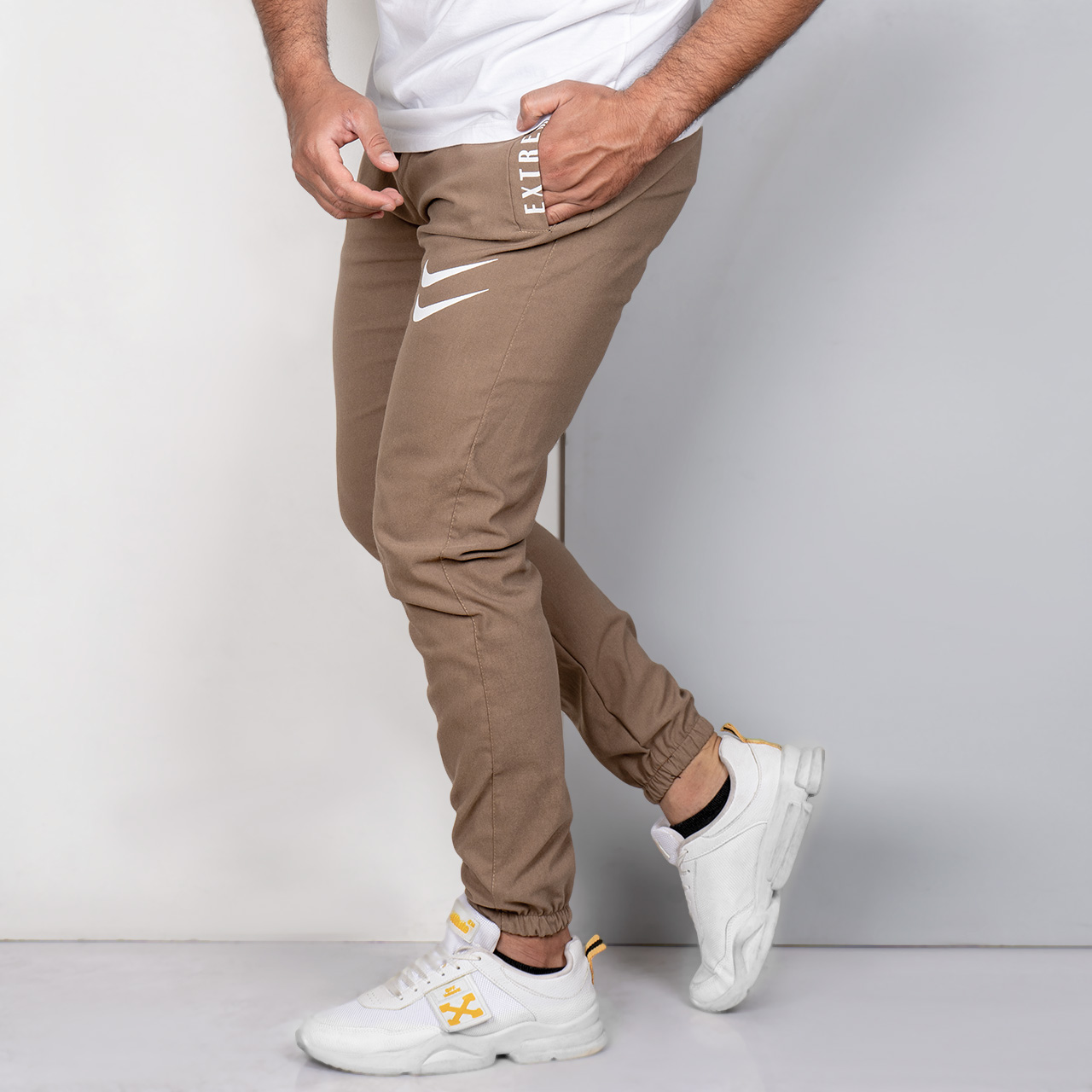 شلوار اسلش نایک کرم مردانه مدل manio