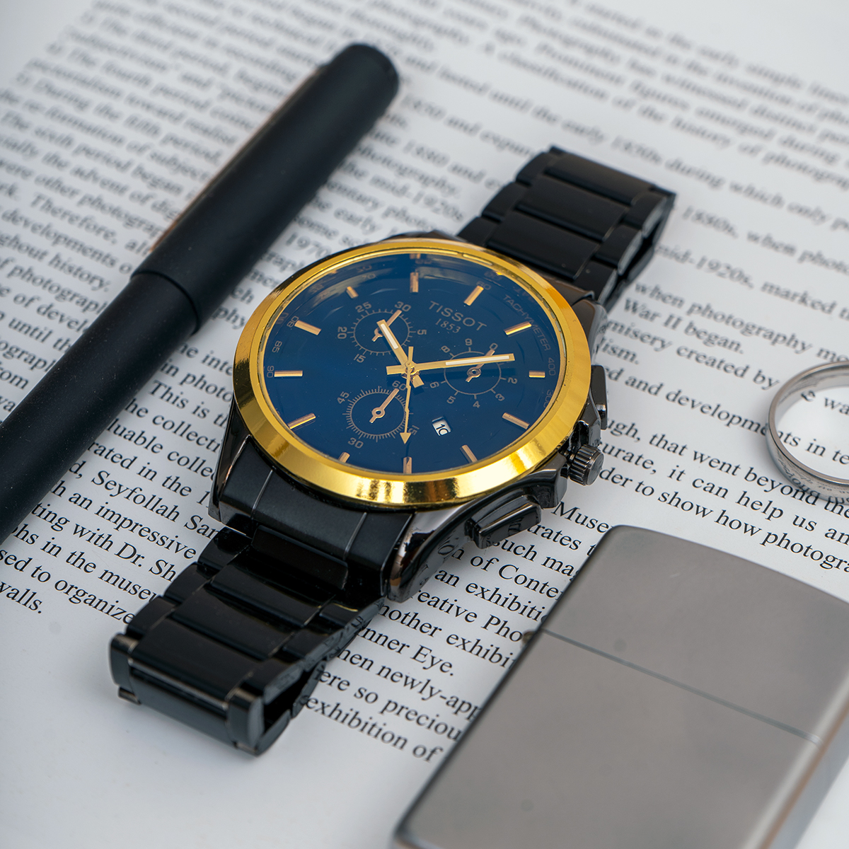 ساعت مچی مردانه مشکی طلایی صفحه آبی مدل Tissot